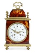 λ A FRENCH TORTOISESHELL AND GILT BRASS MANTEL CLOCK
