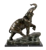 A LARGE BRONZED CERAMIC MODEL OF AN ELEPHANT