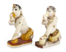 A PAIR OF INDIAN CARVED ALABASTER AND POLYCHROME DECORATED BAL GOPAL FIGURES