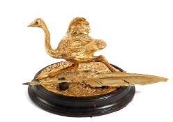 A NOVELTY GILT BRONZE OSTRICH INKWELL