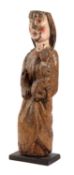 AN EXTREMELY RARE ROMANESQUE CARVED AND POLYCHROME MADONNA AND CHILD GROUP