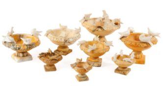 A COLLECTION OF EIGHT ITALIAN ALABASTER GRAND TOUR PLINY'S DOVE TAZZAS