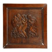 A CONTINENTAL CARVED WALNUT PANEL