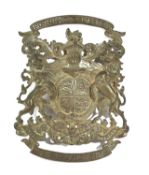 A VICTORIAN BRASS ROYAL WARRANT WALL PLAQUE