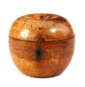 A TREEN FRUITWOOD APPLE TEA CADDY