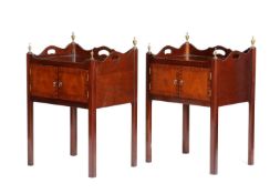 A PAIR OF MAHOGANY BEDSIDE TABLES