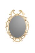 A CARVED GILTWOOD WALL MIRROR