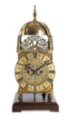 A VICTORIAN BRASS LANTERN CLOCK