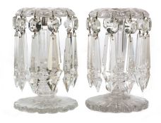 A PAIR OF VICTORIAN CUT GLASS LUSTRE CANDLESTICKS