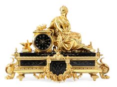 A FRENCH NAPOLEON III GILT SPELTER AND BLACK MARBLE MANTEL CLOCK