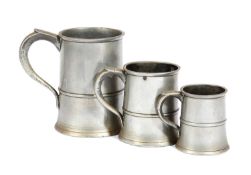 A GRADUATED SET OF THREE GEORGE III SCOTTISH PEWTER MUGS