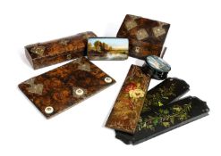 AN EARLY VICTORIAN PAPIER-MACHE DESK SET