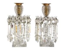 A PAIR OF REGENCY CUT GLASS TABLE LUSTRE CANDLESTICKS
