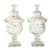 A PAIR OF REGENCY CUT GLASS SWEETMEAT JARS AND COVERS