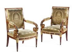 A PAIR OF ANGLO-FRENCH MAHOGANY AND PARCEL GILT OPEN ARMCHAIRS