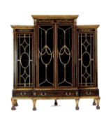 A BLACK LACQUER AND GILT CHINOISERIE BOOKCASE OR DISPLAY CABINET