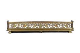 A REGENCY GILT BRASS FENDER