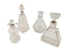 Three French Art Deco silver-mounted glass decanters,