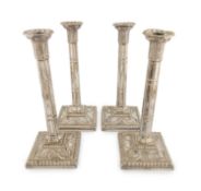 A matched set of four Victorian electroplated candlesticks,