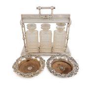An electroplated three-bottle tantalus,