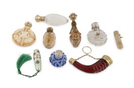 A collection of silver and metalware-mounted scent bottles,