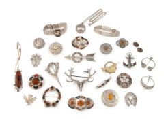 A collection of Scottish silver brooches,
