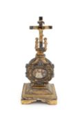 A continental silver and gilded metalware cross and reliquary holder,