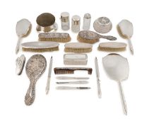 A collection of silver dressing table pieces,