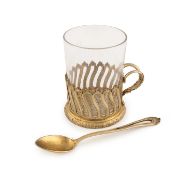 By Fabergé, a cased late-19th century Russian silver-gilt tea glass holder and spoon,