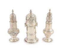 A small collection of three silver casters,