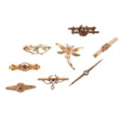 EIGHT GOLD BAR BROOCHES