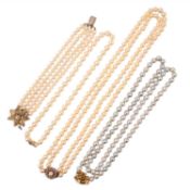 THREE CULTURED PEARL NECKLACES AND A CULTURED PEARL BRACELET