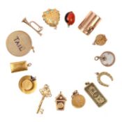 A COLLECTION OF 14 GOLD CHARMS, 19TH CENTURY AND LATER