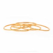 SIX GOLD BANGLES