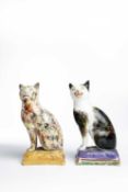 A PEARLWARE FIGURE OF A CAT AND ANOTHER