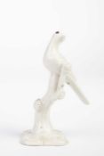 A STAFFORDSHIRE WHITE SALTGLAZED FIGURE OF A BIRD