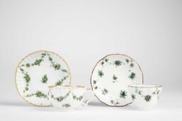 A BRISTOL TEA BOWL AND SAUCER