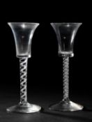 TWO SIMILAR MIXED TWIST WINE GLASSES