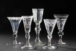 AN ENGRAVED WINE GLASS