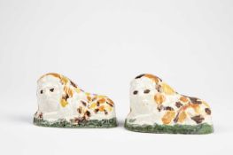 TWO PRATTWARE POTTERY LIONS