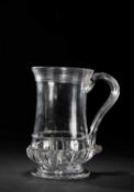A GLASS TANKARD OR MUG