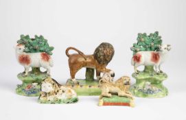 A PEARLWARE FIGURE OF A MEDICI LION