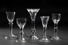 FIVE BALUSTROID WINE GLASSES