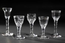 FIVE WINE GLASSES WITH FACETED STEMS
