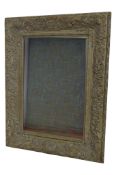 A large antique style rectangular wall mirror with bevelled edge plate and swept cushion moulded