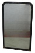 An antique Georgian style wall mirror with ebonised moulded frame applied gilt mouldings and
