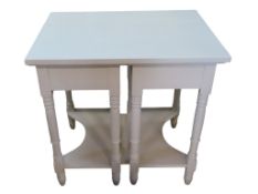 A painted centre table with rectangular top over two frieze drawers on turned supports (formed