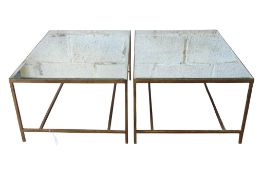 A pair of contemporary gilt painted steel framed occasional tables with inset rectangular bevelled