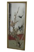 A rectangular gilt framed wall mirror with bevelled edge plate and painted House Martin's and floral