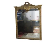 A large and impressive 19th century full length wall mirror, the gilt frame bound with floral